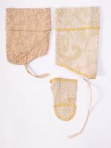 An infant's cotton open glove with a thumb hole,