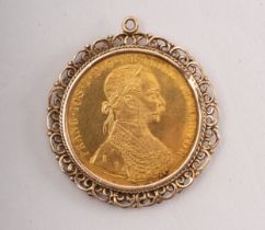 A gold plated Austrian-Hungarian four Ducat medallion, dated 1915, (most probably a restrike),