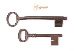 An 18th century Irish steel key, 21cm long, together with one other 18th century steel key,