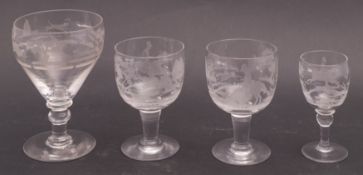 A group of four 19th century hunting theme drinking glasses, comprising of a rummer,