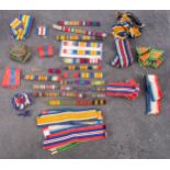 A collection of various medal ribbons and ribbon bars.