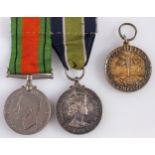 A WWII pair, consisting of Defence Medal and Colonial Police Long Service Medal,