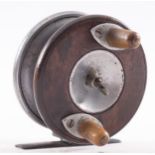 A pre-war mahogany and alloy 3 inch Nottingham reel,