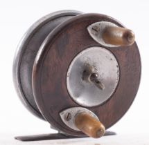 A pre-war mahogany and alloy 3 inch Nottingham reel,