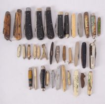 A collection of various penknives and pocket knives, various makers including William Rodgers,