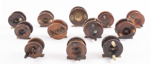 Ten small un-named Nottingham star back reels and two spin back reels,