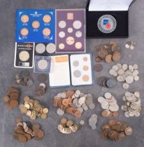 A collection of British and world coins including pre-1947 silver, Georgian copper,