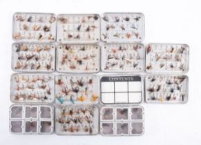 Seven Wheatley alloy Fly Fishing boxes containing mostly dry flies some wet,