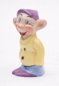 An early 20th century porcelain Disney 'Dopey' toothbrush holder,