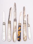 A group of five silver and mother of pearl fruit knives,