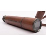 An early 20th century leather cased three draw telescope, maker Broadhurst & Clarkson, London.
