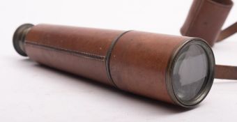 An early 20th century leather cased three draw telescope, maker Broadhurst & Clarkson, London.