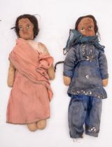 A pair of mid 20th century Indian Linen head dolls, both with applied wigs and painted faces ,