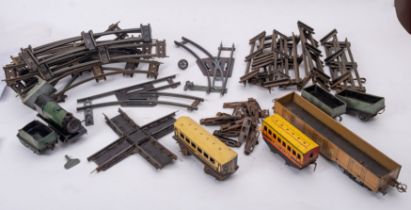 An early 20th century Tinplate Clockwork train set and track,