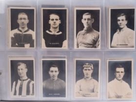 An album of Trade Sports cards to include 50 Thomson (D.
