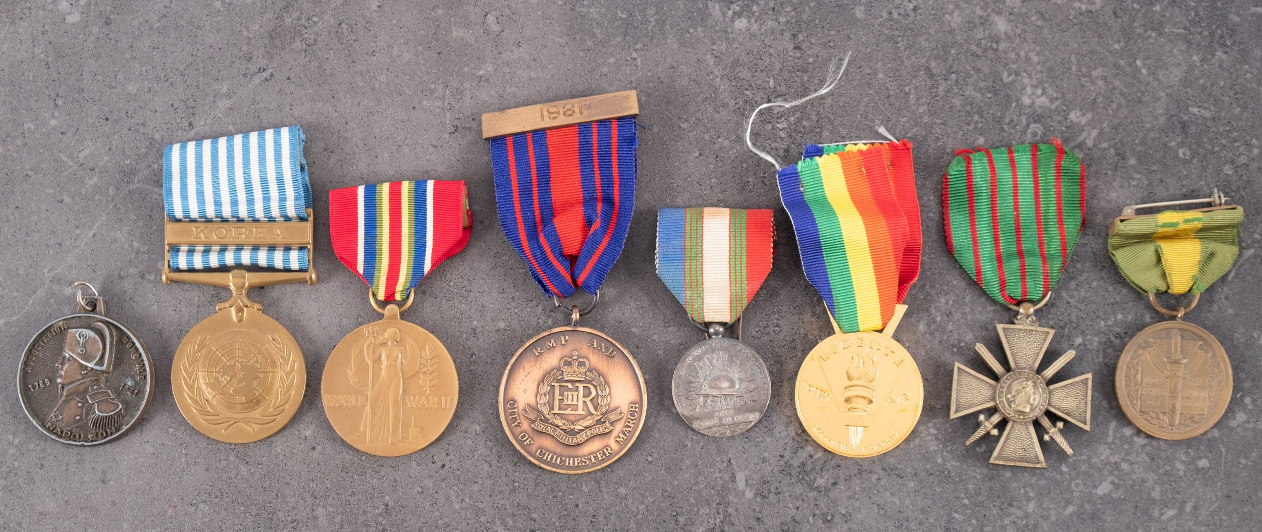 An United Nations Korea Medal, together with a small collection of world medals.