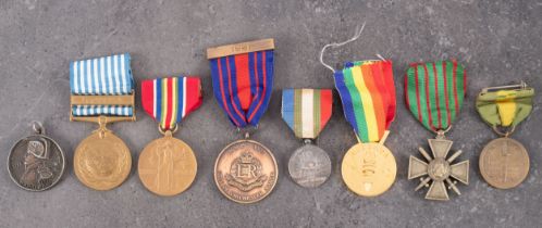 An United Nations Korea Medal, together with a small collection of world medals.