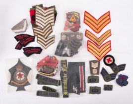 A quantity of British and foreign cloth patches together with RN hat tallies etc (a lot)