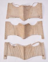 Three cotton and linen corsets of diminutive dimensions, possibly trade samples or child's pieces,