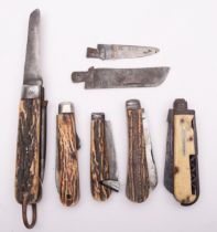 A group of five 19th century English pocket knives comprising two farrier's knives,