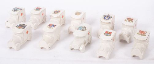 A group of eleven WWI period crested ware Ambulances,