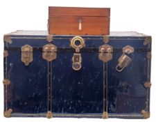 A large blue travelling trunk,
