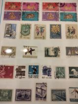 A Collection of stamps in 11 ring binders including China, Singapore,