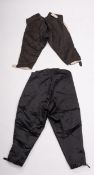 Two pairs of George III and later gentleman's black silk breeches,