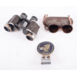 A pair of Leitz Wetzlar 6x30 binoculars, together with a pair of Carl Zeiss W15 Umbral sunglasses,