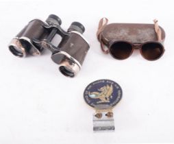 A pair of Leitz Wetzlar 6x30 binoculars, together with a pair of Carl Zeiss W15 Umbral sunglasses,