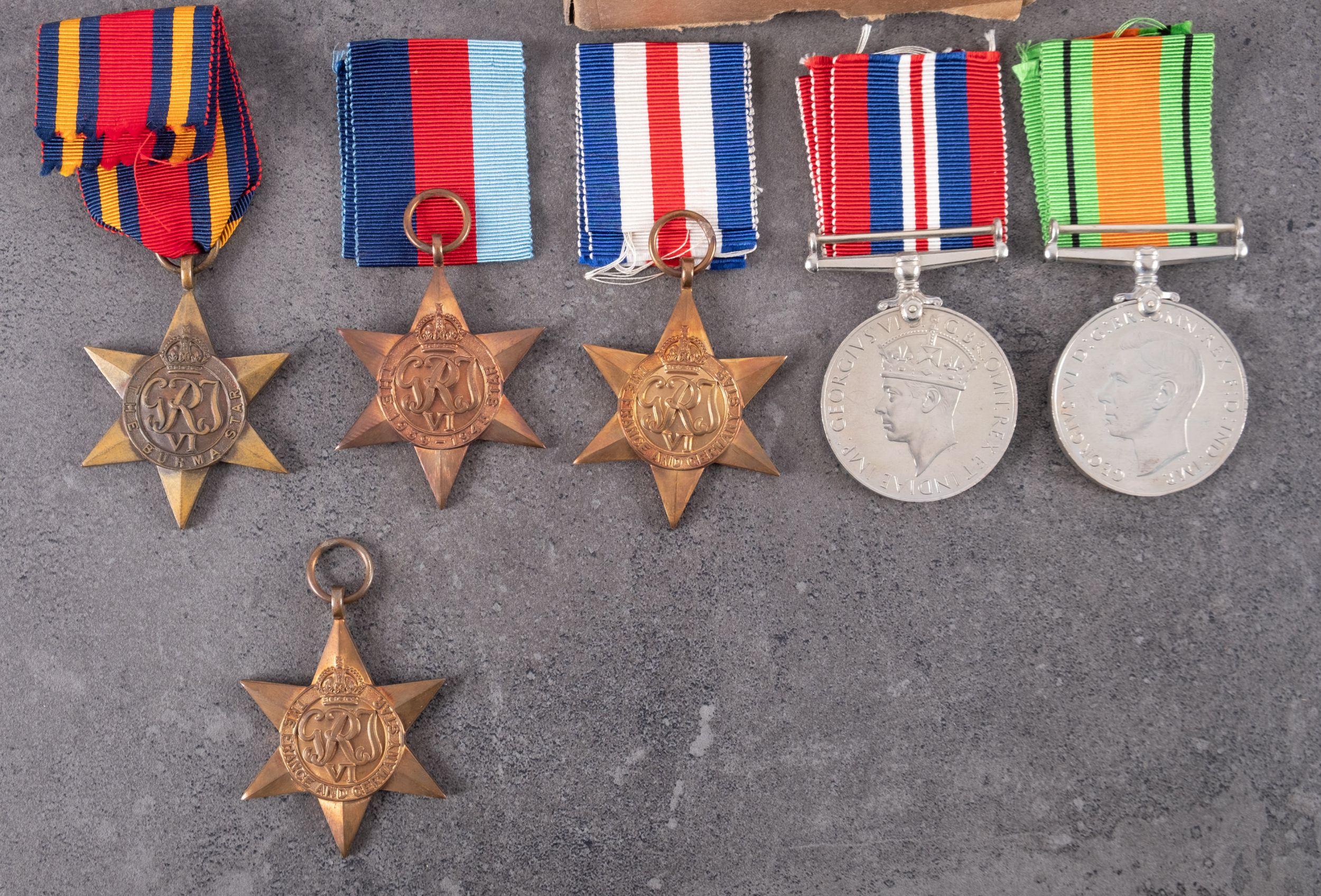 A collection of WWII service medals with postage boxes. - Image 3 of 3