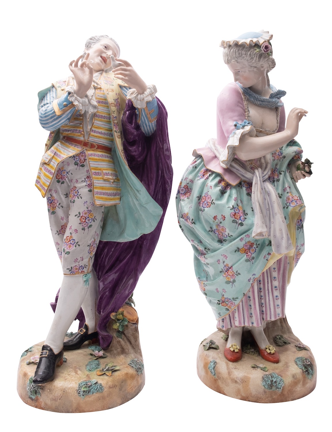 A pair of large late 19th century Continental porcelain figures of a gallant and companion wearing