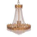 A gilt metal and cut glass hung ten light electrolier in Regency style,