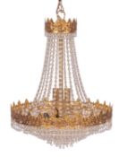 A gilt metal and cut glass hung ten light electrolier in Regency style,