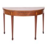 A George III mahogany and line inlaid demi-lune tea table,