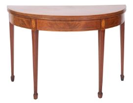 A George III mahogany and line inlaid demi-lune tea table,