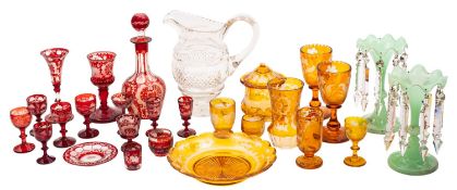 A mixed group of primarily Bohemian glass, comprising amber and ruby flashed goblets, glasses,