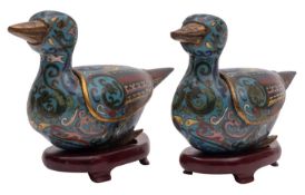 A pair of Chinese cloisonne duck censers and covers decorated with mythical birds and scrollwork on