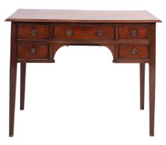 A mahogany and crossbanded writing table in George III style; early 20th century;