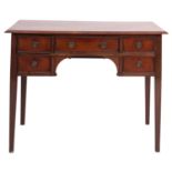 A mahogany and crossbanded writing table in George III style; early 20th century;