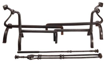 Two pairs of steel andirons, in 17th century style, early 20th century; the larger pair 34cm high,