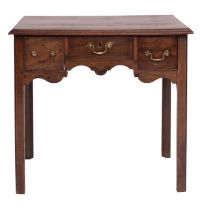 A George III mahogany lowboy side table, circa 1765; the top with moulded edges,