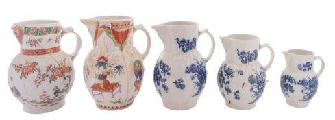 A group of five Caughley and Worcester cabbage-leaf mask jugs comprising three Caughley blue and