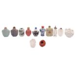 A collection of Chinese glass and ceramic snuff bottles including a yellow ground famille rose