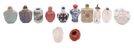A collection of Chinese glass and ceramic snuff bottles including a yellow ground famille rose