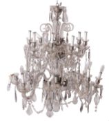 A cut glass sixteen light chandelier in Louis XV taste,