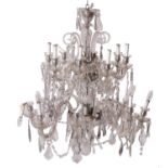 A cut glass sixteen light chandelier in Louis XV taste,