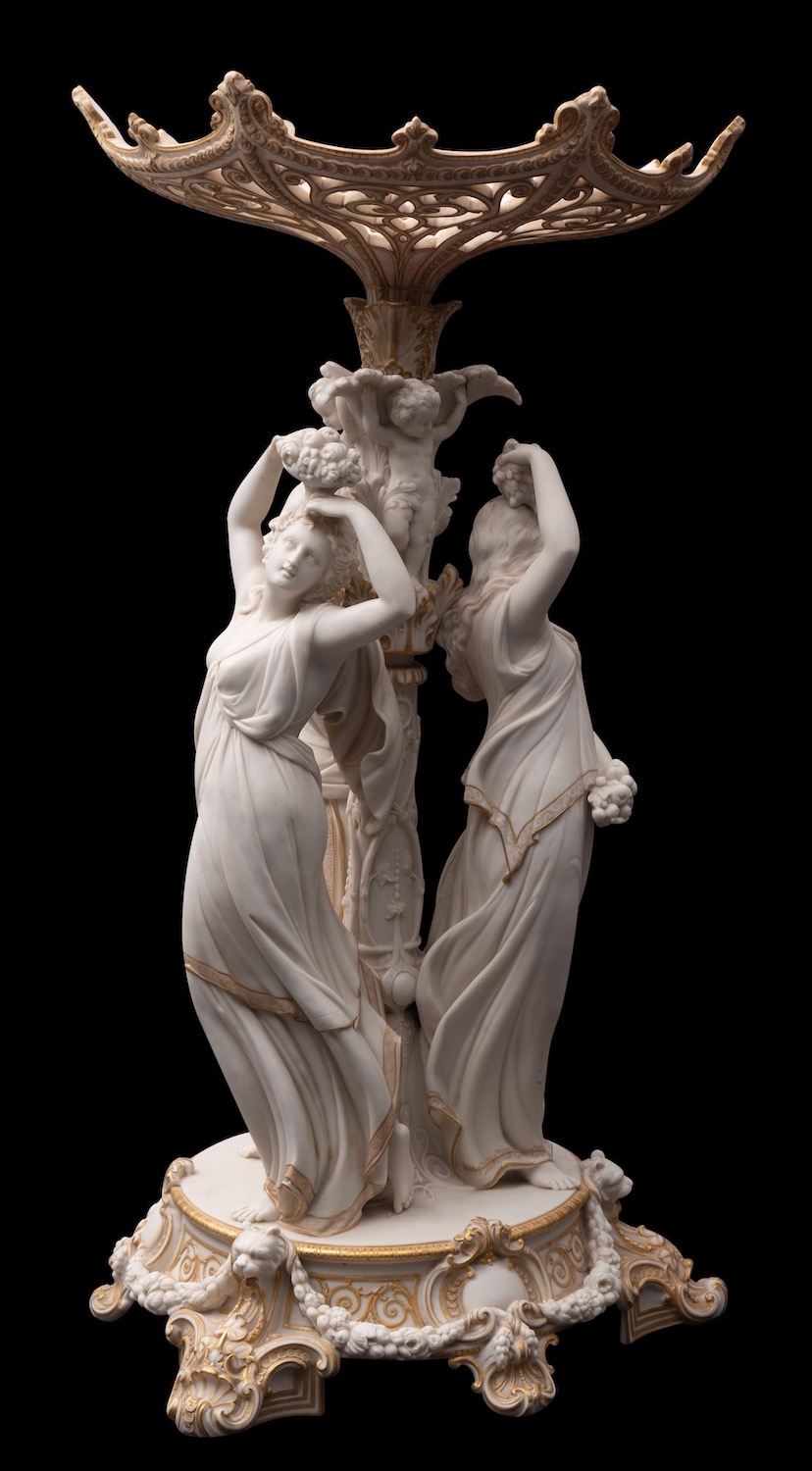 A large 19th century Parian ware centrepiece heightened in gilt,