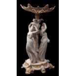 A large 19th century Parian ware centrepiece heightened in gilt,