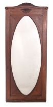 A French oak framed wall mirror,